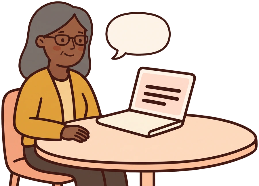 A person at a laptop reading the write-up